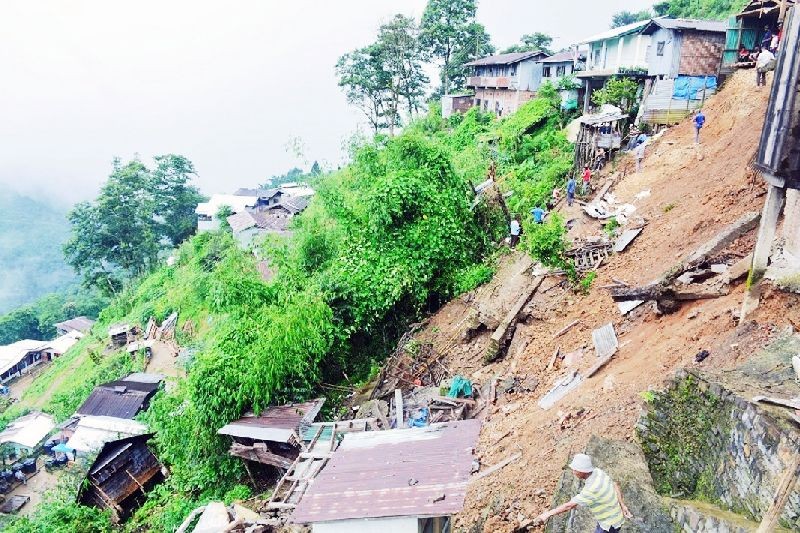 Houses destroyed by a landslide in DC Hill West Colony, Zunheboto town on August 17. (DIPR Photo)